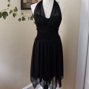 Beautiful shimmery handkerchief hem dress.